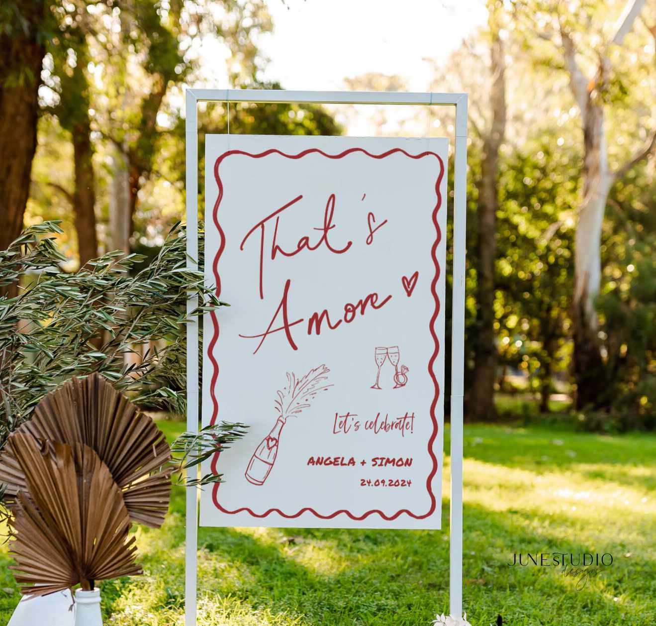 this engagement welcome sign features our original hand drawn champagne bottle and glasses illustration, with engagement ring and wavy border