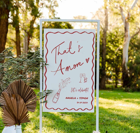 this engagement welcome sign features our original hand drawn champagne bottle and glasses illustration, with engagement ring and wavy border