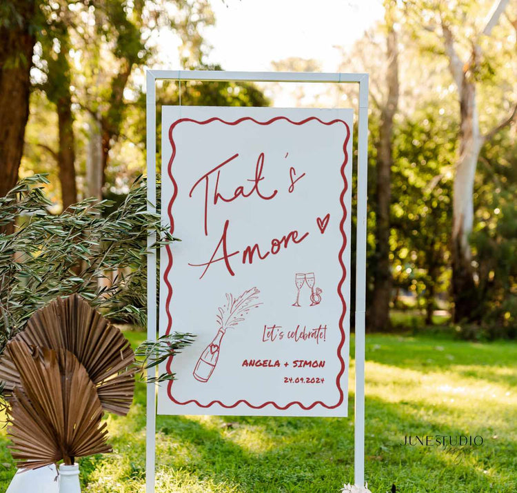 this engagement welcome sign features our original hand drawn champagne bottle and glasses illustration, with engagement ring and wavy border